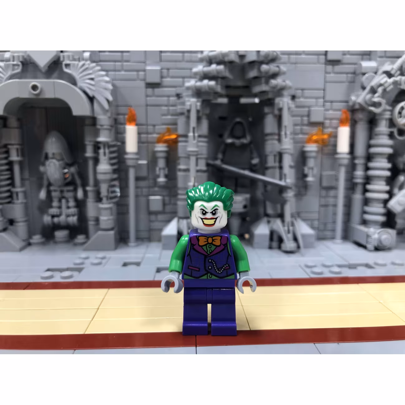 The Joker - Orange Bow Tie, Green Arms The Joker - Orange Bow Tie, Green Arms