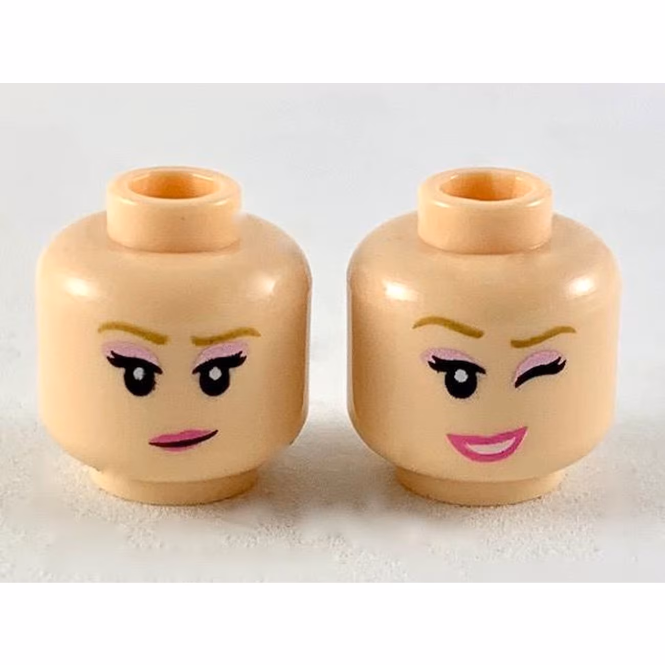 Minifigure, Head Dual Sided Female, Medium Nougat Eyebrows, Medium Lavender Eye Shadow, Dark Pink Lips, Smile / Wink Pattern Minifigure, Head Dual Sided Female, Medium Nougat Eyebrows, Medium Lavender Eye Shadow, Dark Pink Lips, Smile / Wink Pattern