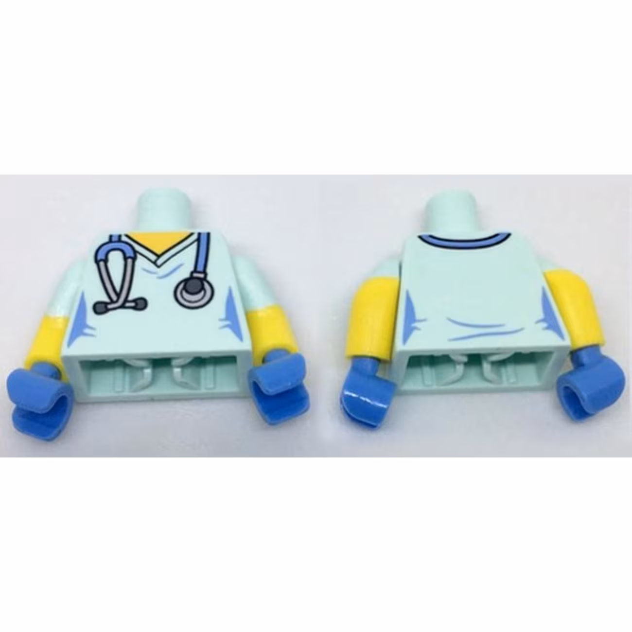 Torso Female Hospital Scrubs with Medium Blue Stethoscope Pattern / Yellow Arms with Molded Light Aqua Short Sleeves Pattern / Medium Blue Hands Torso Female Hospital Scrubs with Medium Blue Stethoscope Pattern / Yellow Arms with Molded Light Aqua Short Sleeves Pattern / Medium Blue Hands