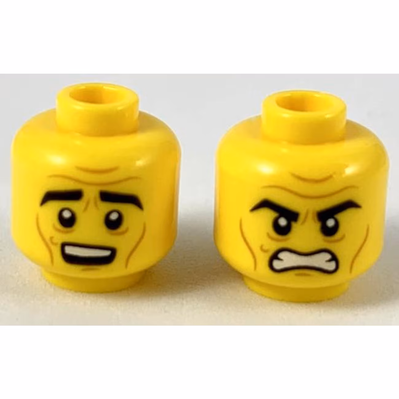 Minifigure, Head Dual Sided Black Thick Eyebrows, Medium Nougat Brow Furrows and Cheek Lines, Surprised / Angry Pattern Minifigure, Head Dual Sided Black Thick Eyebrows, Medium Nougat Brow Furrows and Cheek Lines, Surprised / Angry Pattern