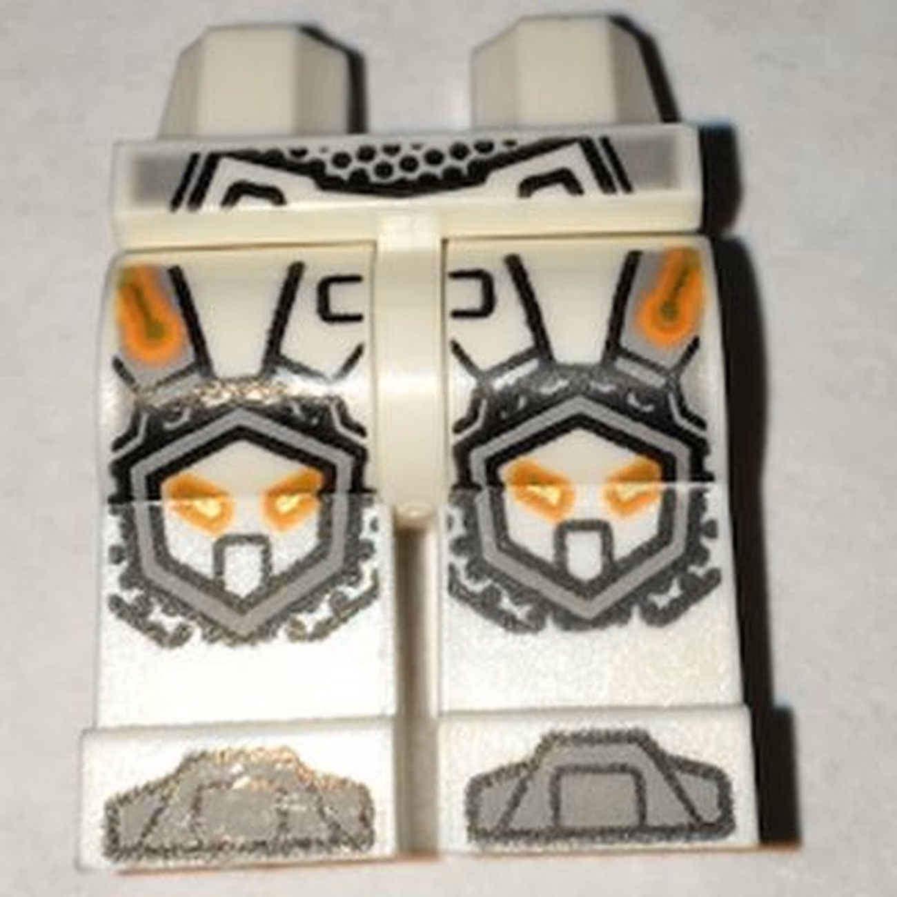Hips and Legs with Orange and Gold Circuitry, Light Bluish Gray Armor, Hexagonal Knee Pads, and Boots Pattern Hips and Legs with Orange and Gold Circuitry, Light Bluish Gray Armor, Hexagonal Knee Pads, and Boots Pattern